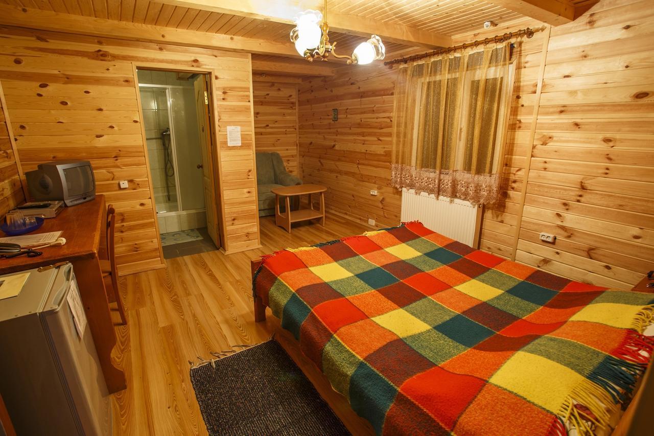 Vedmid Hotell Myslovka Rum bild